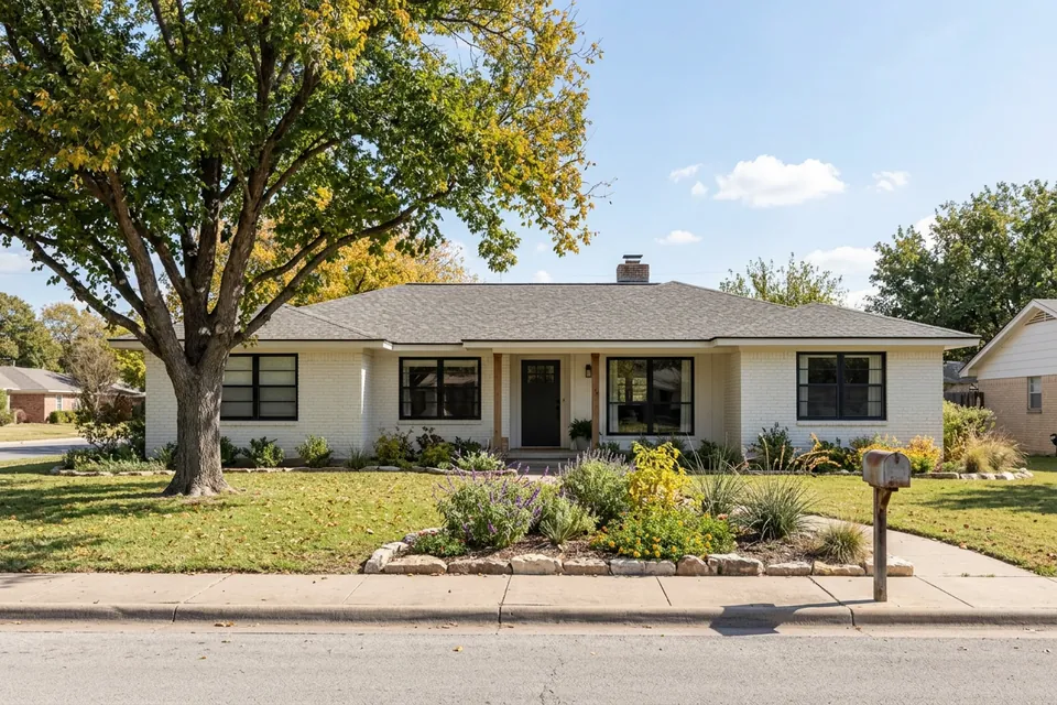 Illustration of a 1970s white-painted brick ranch house