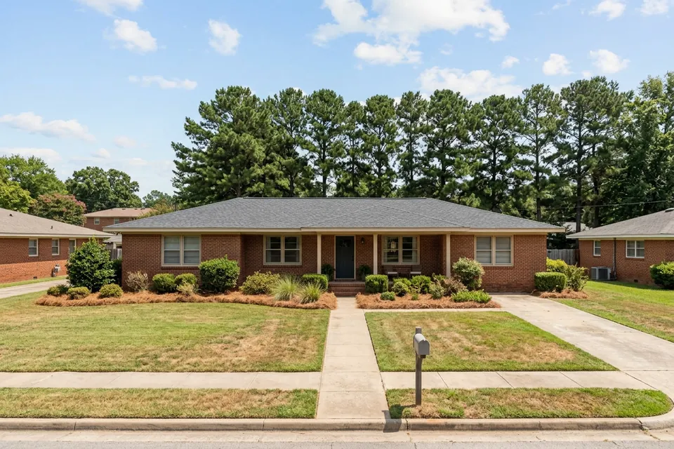 Illustration of a 1970s brick ranch house among pines