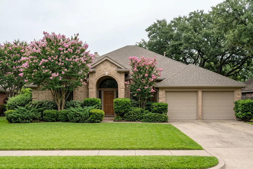 Illustration of a 1980s tan brick house with an arched entry
