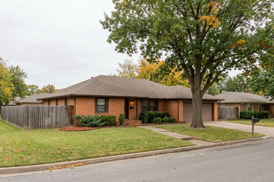 Illustration of a 1970s brick ranch house with a two-car garage