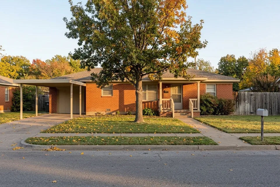 Illustration of a 1960s red brick ranch house with a carport