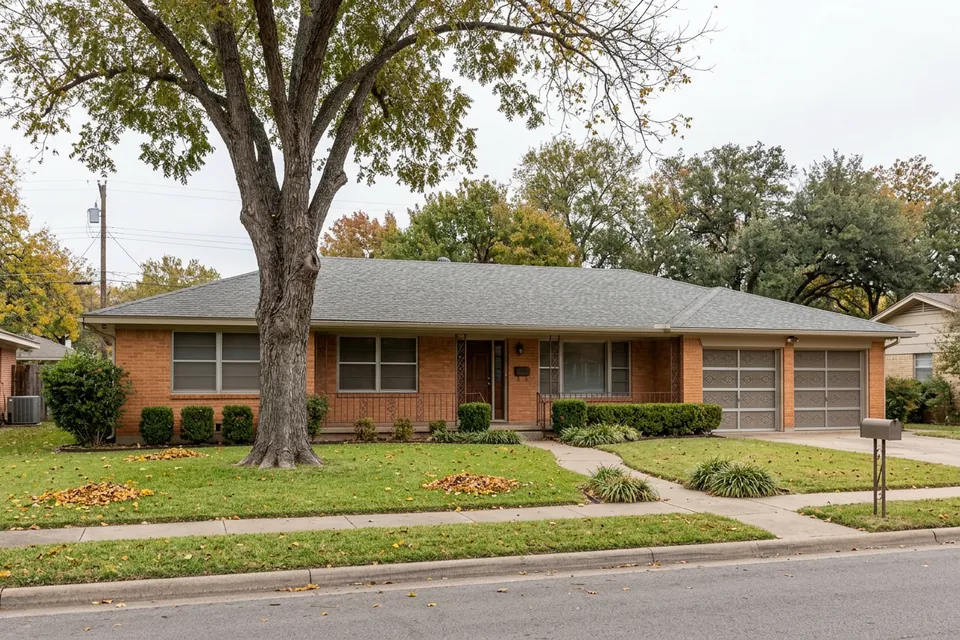 Illustration of a 1970s brick ranch house with a two-car garage