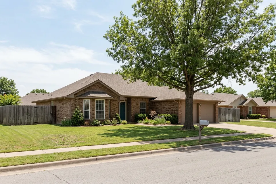 Illustration of a 1980s brown brick ranch house with a bay window