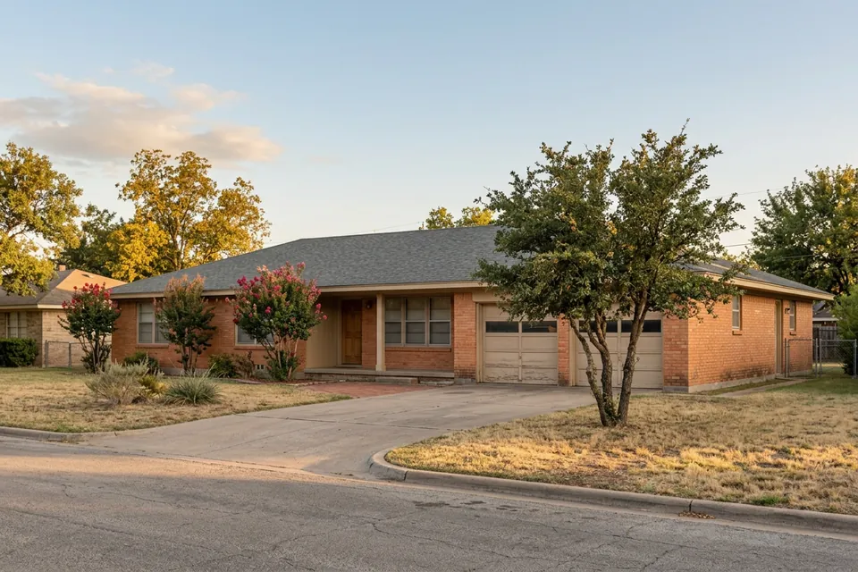Illustration of a 1970s brick ranch house with a two-car garage