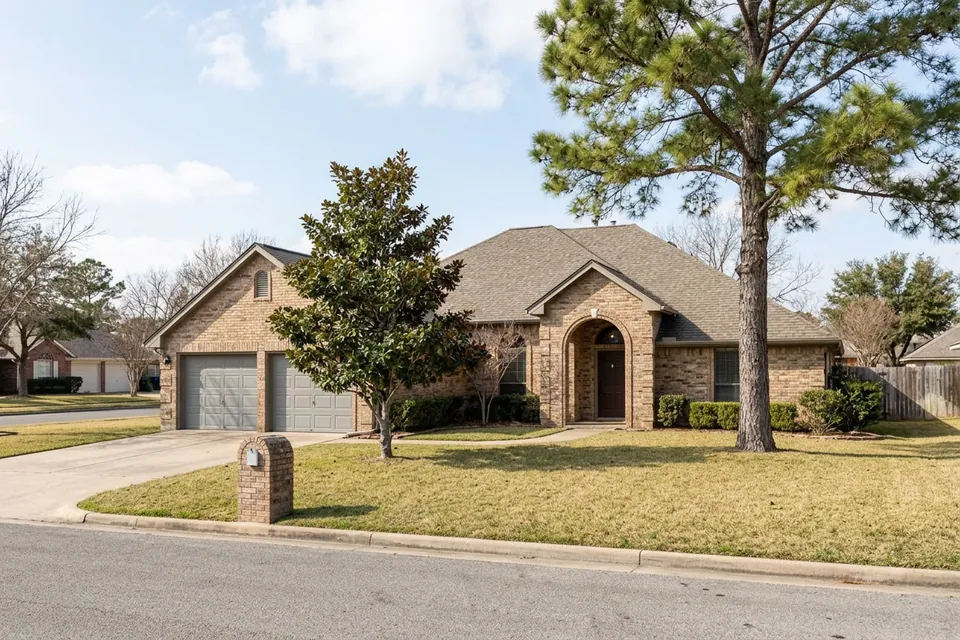 Illustration of a 1980s tan brick house with an arched entry