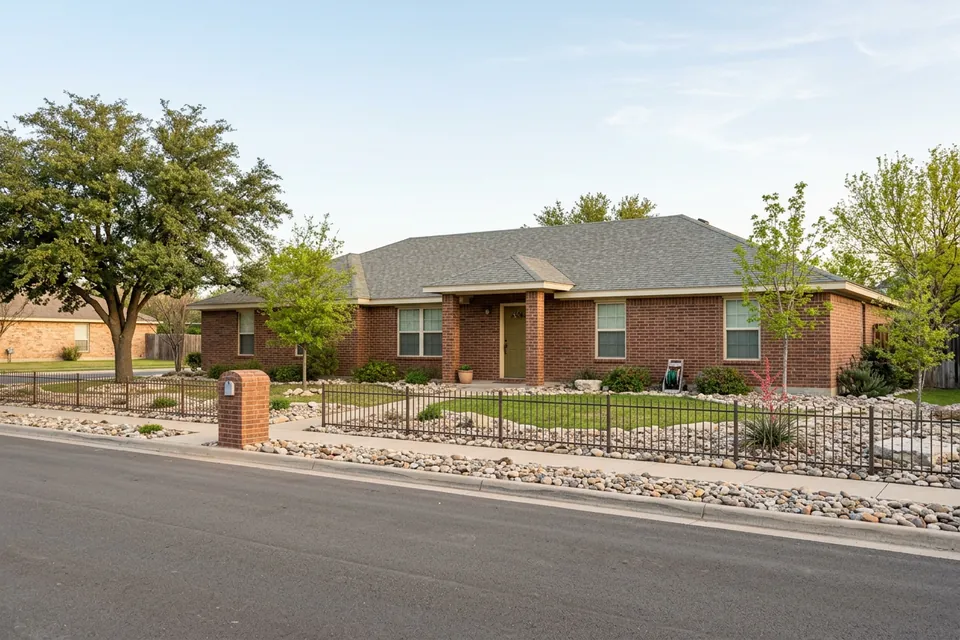 Illustration of a red-brown brick ranch house